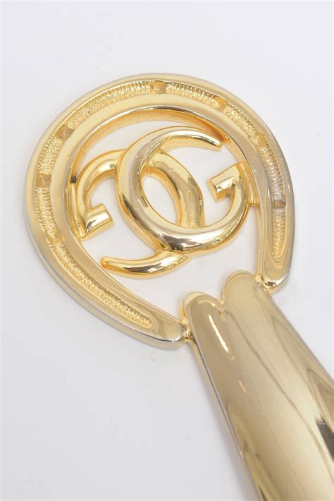 gucci shoe horn gold|Vintage Original Gucci Shoe horn, gold tone Gucci Logo very rare.